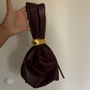 Elegant Brown Leather Handbag with Gold Accent